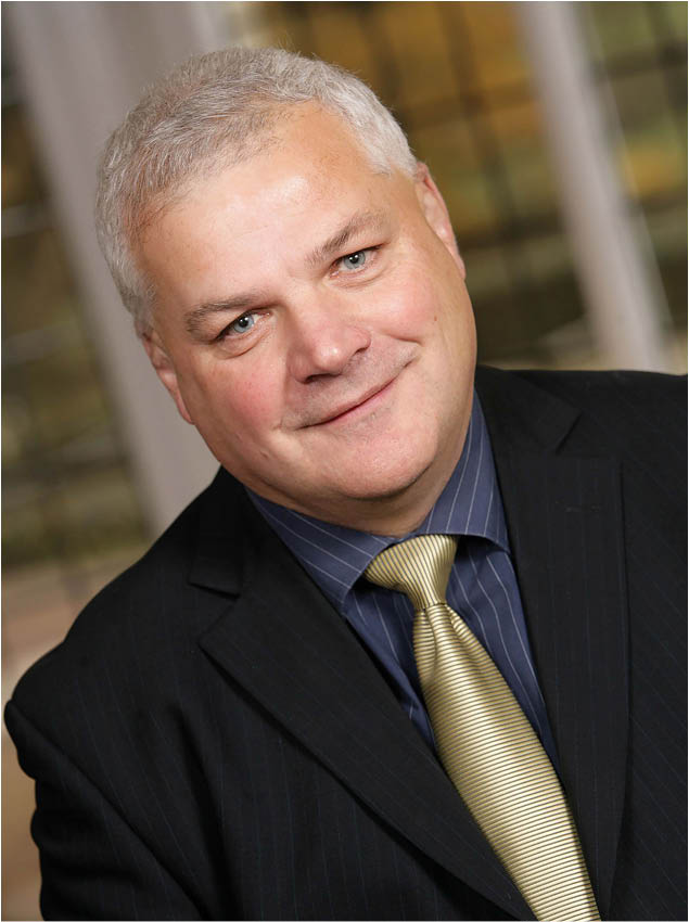 (Photoshoot 1106-061) Energy Wholsale team member portrait. Gary Ulliott