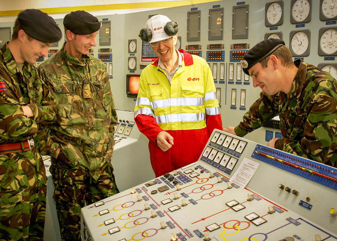 (Photo shoot No: 1105-076) EON UK's Nick Hollick escorts soldiers from the Royal Engineers as they visit Ratcliffe Power Station