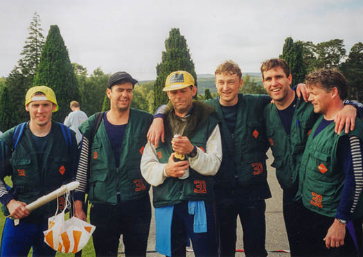 1997 Power Challenge Loch Rannoch. Ratcliffe Rats just finished and cracking open the not too expensive fizz.  Team L-R Steve Potts, Jeff Archer, Jim Morton, Chris Smith, Nigel Bates, Arthur Lakin.